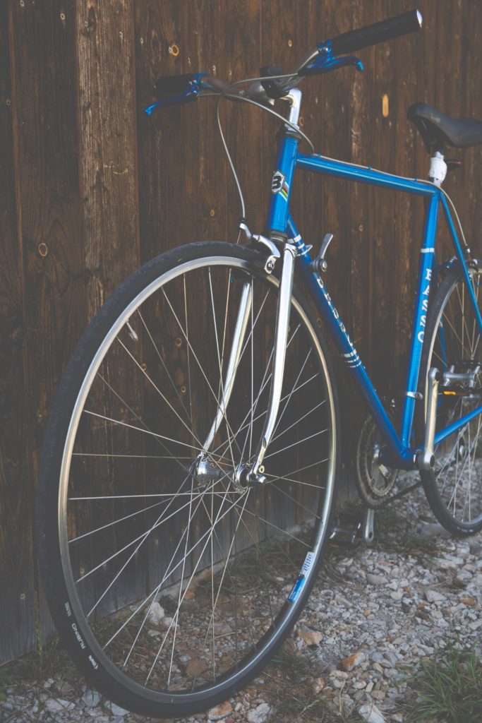 Image: Bicycle by a wall.