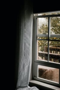 water dew on clear glass sliding window during daytime