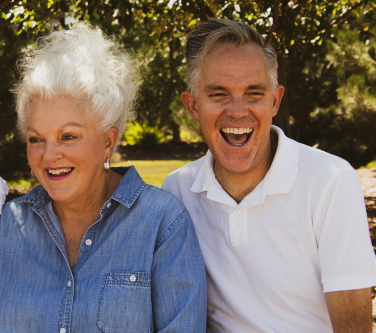 thriving, man wearing white polo shirt